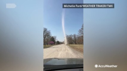 Dust devil towers over Oklahoma neighborhood