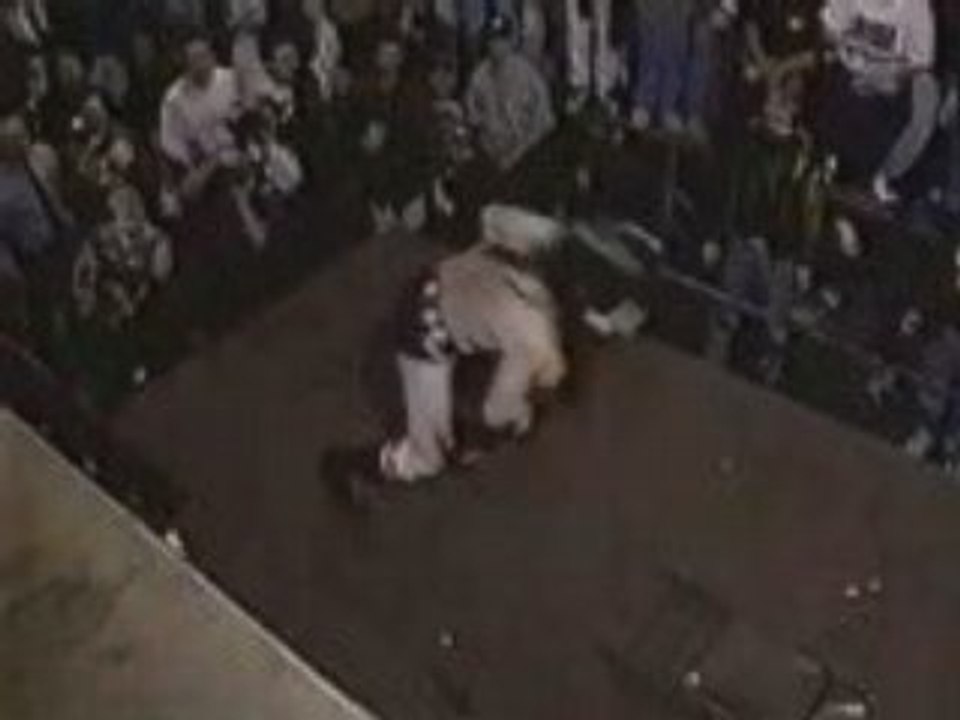 ECW-Rey Mysterio Jr.jumps off a balcony and Huracaranas Psic