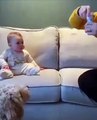 Baby has the giggles as pup catches bubbles