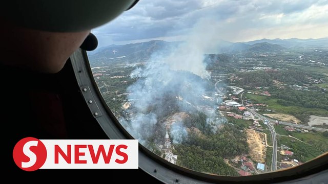 Bomba deploys helicopter from Miri to help put out open fires in Sabah