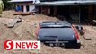 Indonesia floods, landslide kill 19, with seven missing