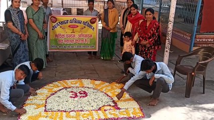 Rangoli made with flower petals