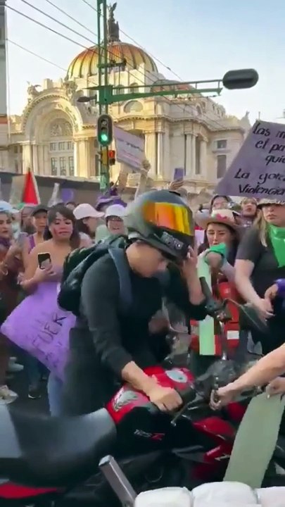Motorcyclist ruins International Women's Day parade