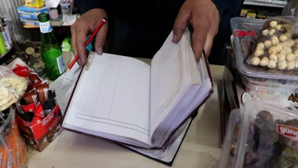 Bakkalın veresiye defterindeki borcu sildirdi