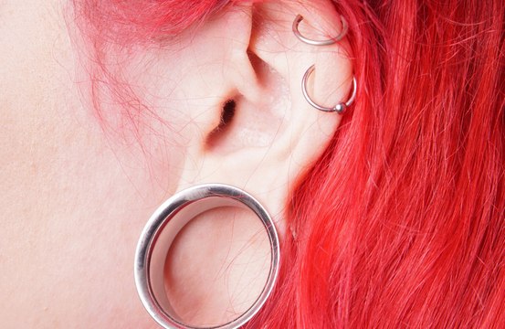 Archaeologists have discovered evidence of body piercings in skeletons from 11,000 years ago