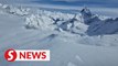 Helicopters search for skier in Switzerland as five others found dead