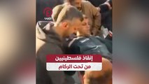 إنقاذ فلسطينيين من تحت الركام
