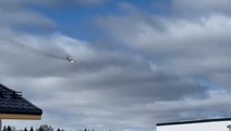 Burning Russian military plane flies over houses before ‘crashing’