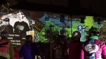 Hundreds gather on traffic island to watch active travel inspired projection show