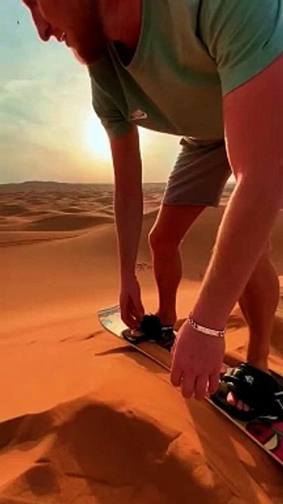 sandboarding at dubai desert safari