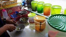 TRADITIONAL DRINK ES TELER OR ORIGINAL INDONESIAN FRUITS COCKTAILS INDONESIAN STREET FOOD