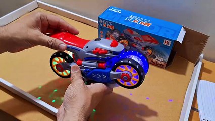 Скачать видео: Unboxing and Review of YAMAMA Stunt Stop Motorcycle Musical Toy For Kids Electric Universal 360 Degree Rotating Motorbike Toy With 3D Lights And Music For Kids