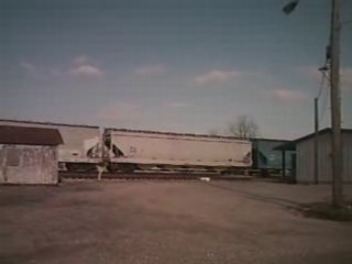 Grain train passing the depot