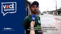 Açougueiro Hélio Cruz lamenta rua esburacada no final da linha do Paar, em Ananindeua