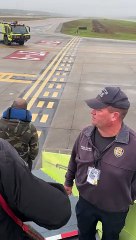 People Evacuating Jetliner After Bad Landing