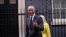 Barack Obama jokes with reporters as he leaves Downing Street after visiting Rishi Sunak