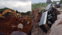 Carreta 'engolida' por cratera é retirada com retroescavadeira; vídeo