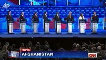 Romney y  Huntsman debaten sobre Politicas de Afganistán  Debate Republicano