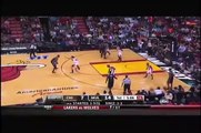 LeBron James jumps over John Lucas  Chicago vs Miami