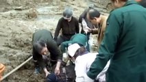 Mineros Rescatados depues de Estar sepultados bajo tierra en China