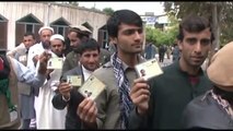 Afghan Voters Flock to Polling Stations