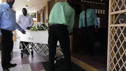 FUNERAL FOR SLAIN GEORGE FAMILY MEMBERS