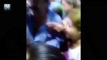 El apasionado beso de Layin a mujer joven