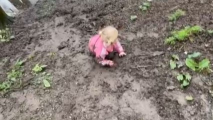 Muddy patch sparks a giggle-filled adventure for young girl and her dad