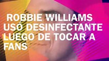 A Robbie Williams le dan ASCO SUS FANS usa GEL ANTIBACTERIAL