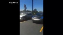 Woman completely stomps out car windshield