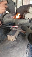 Two zone blacksmiths working hard together -- blacksmith work-- blacksmiths short video