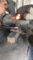 Two zone blacksmiths working hard together -- blacksmith work-- blacksmiths short video