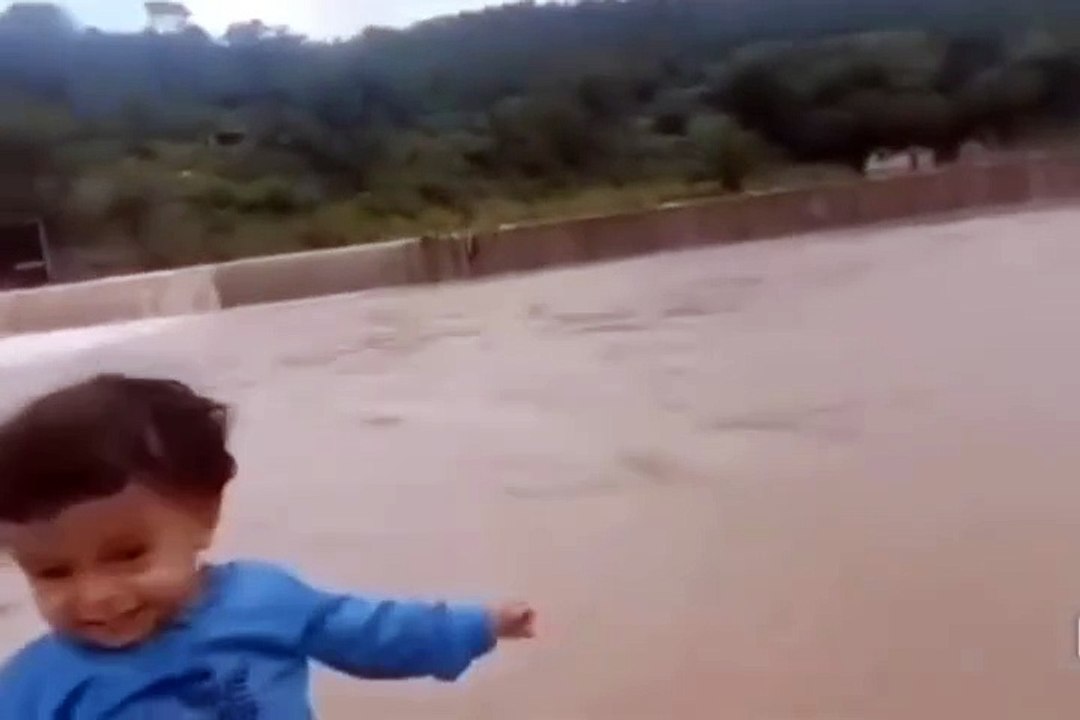 Heartbreaking Moments: Child Drowns and Wall Collapses During Flood