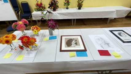 Flower arrangements and art at North Tawton WI Produce and Craft Show