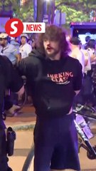 Police arrest protesters near presidential debate venue