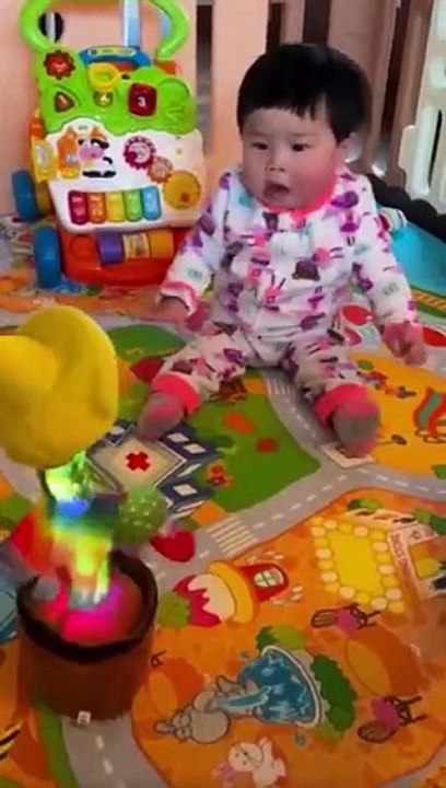 Babies play dancing cactus toy. Cutest baby funniest moments.