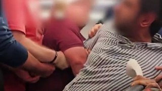 Dramatic Moment Unruly Passenger Thrown off American Airlines Flight_