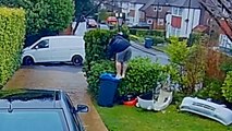 Dad falls off wheelie bin and into bushes - while trying to change batteries