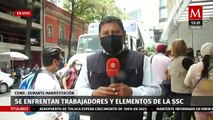 Trabajadores se enfrentan con elementos de la SSC en CdMx