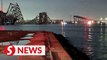 Baltimore bridge collapses after Singapore-flagged ship collision; search under way for survivors