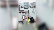 Hombre cruza nadando canal para ayudar a su vecino a salvar el muelle