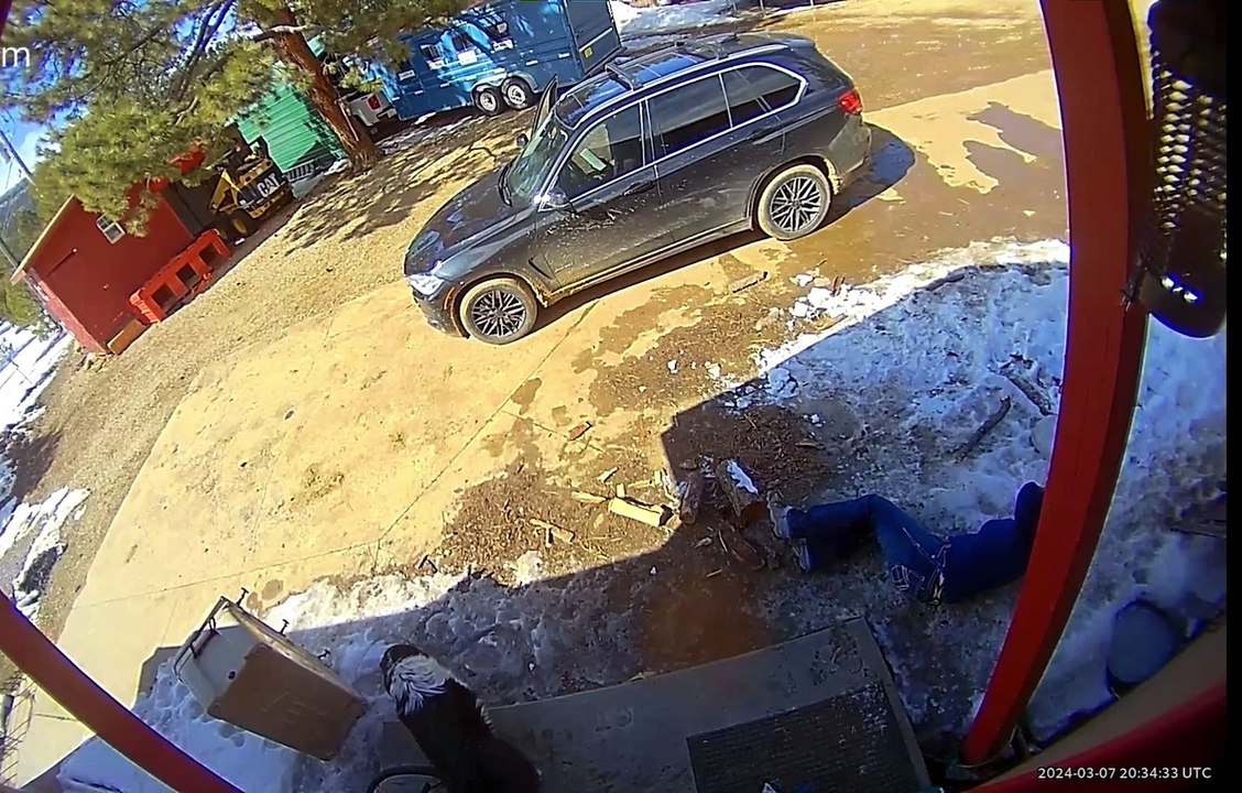 Woman Slips on Ice While Walking Back to House
