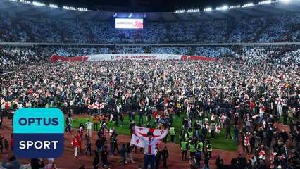 Georgia fans storm pitch after qualifying for first tournament and knocking out Greece