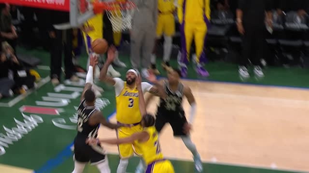 AD makes game-saving block on Lillard