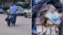 Argentina, commerciante paga la bolletta con una carriola piena di denaro