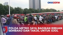 Polda Metro Jaya Bagikan 2.500 Sembako dan Takjil untuk Ojek Online