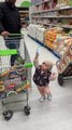 Sneaky Snack Attack! Toddler Fills Cart with Treats While Dad's on Phone