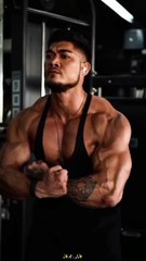 Boy Doing Hard workout In Gym