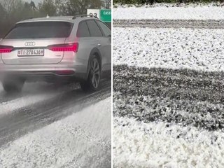 Video herunterladen: Grandinata sul Lago Maggiore: strade imbiancate e traffico a rilento