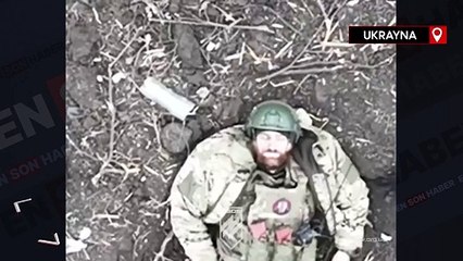 El bombası, baygın Rus askerinin kaskından sekti